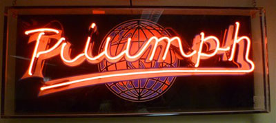 Triumph Sign